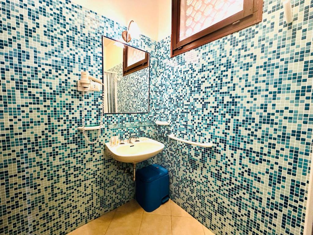 Ванная комната в Residence Hotel La Pelosetta