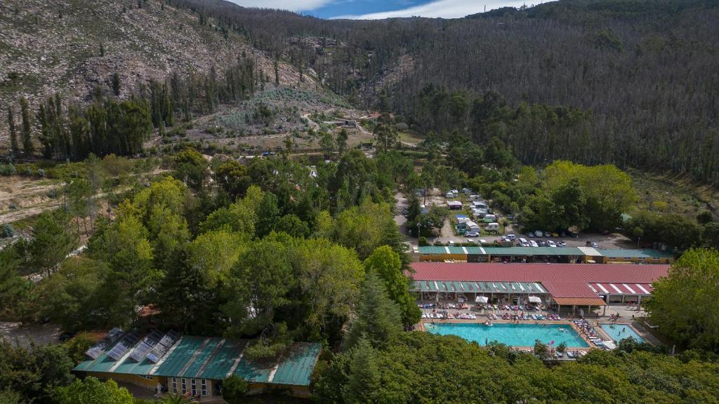 an aerial view of a resort with a pool at Camping Rural Ria de Arosa 2 in Ribeira