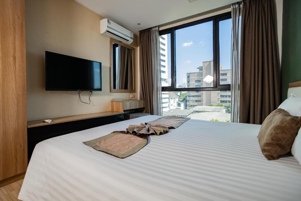 Ramada by Wyndham Bangkok Ten Ekamai Residences - One-Bedroom Deluxe King Room