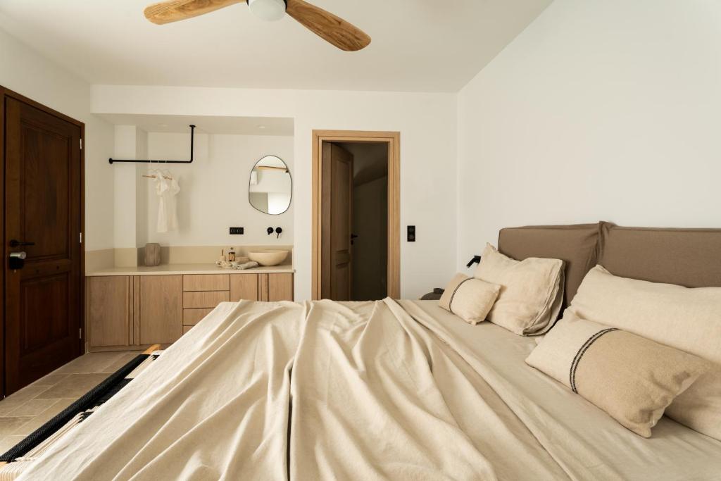 Postel nebo postele na pokoji v ubytování Cortiletto Timeless Suites