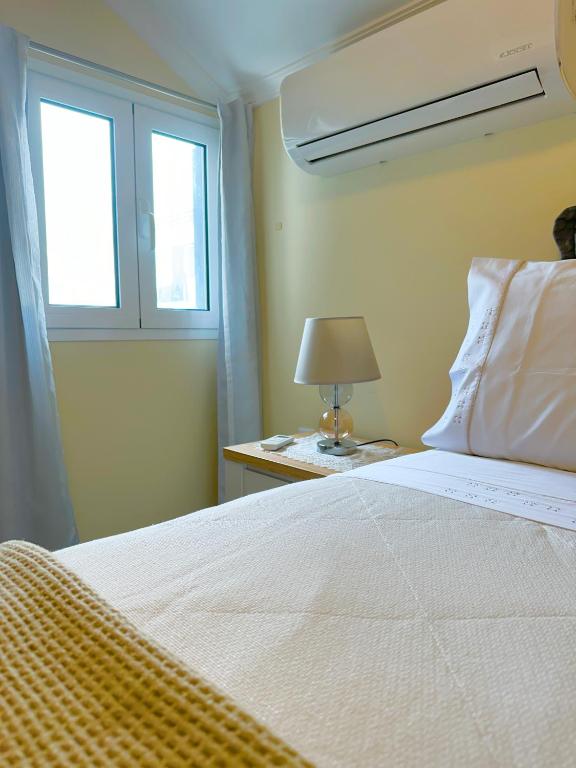 Postel nebo postele na pokoji v ubytování Antonella Home Funchal