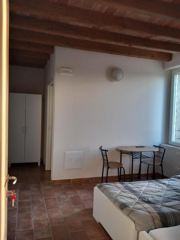 Postel nebo postele na pokoji v ubytování L'Antico Fienile Agriturismo