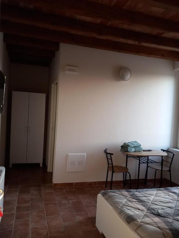 Postel nebo postele na pokoji v ubytování L'Antico Fienile Agriturismo