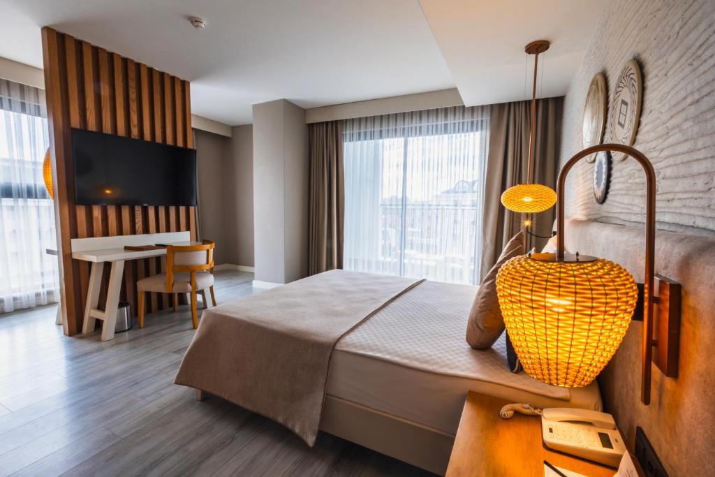 Postel nebo postele na pokoji v ubytování Side Royal Style Hotel