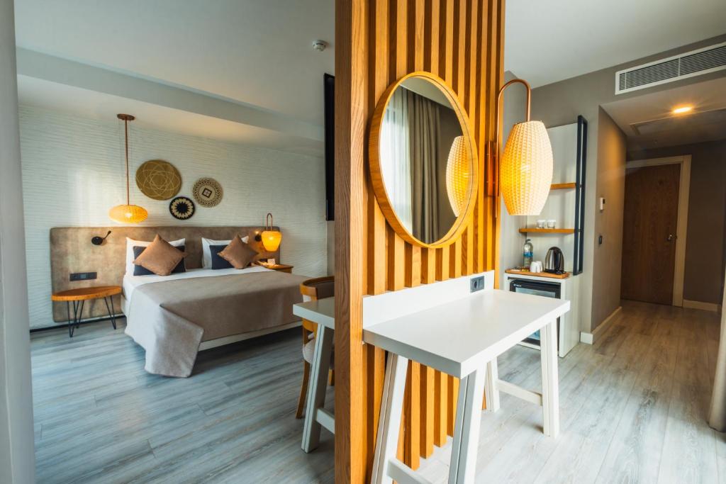 Postel nebo postele na pokoji v ubytování Side Royal Style Hotel