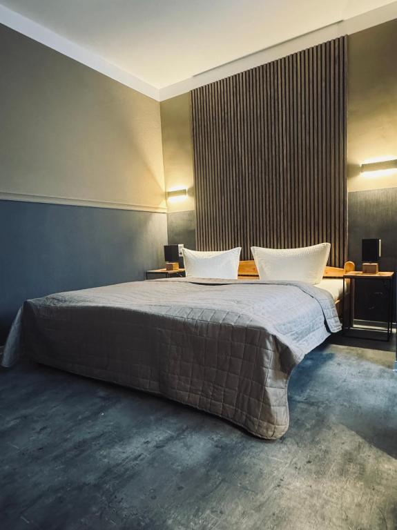 Postel nebo postele na pokoji v ubytování Hotel Garni „zum Bären“
