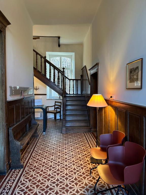Posezení v ubytování Château du Pont d'Oye