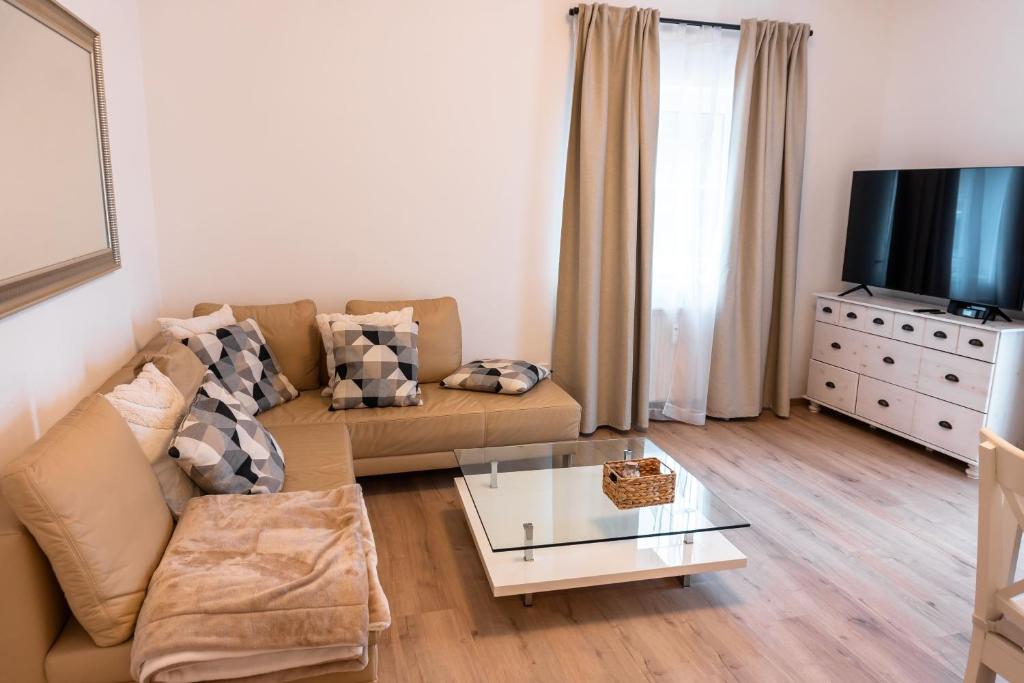 Televízia a/alebo spoločenská miestnosť v ubytovaní Apartment ReRo