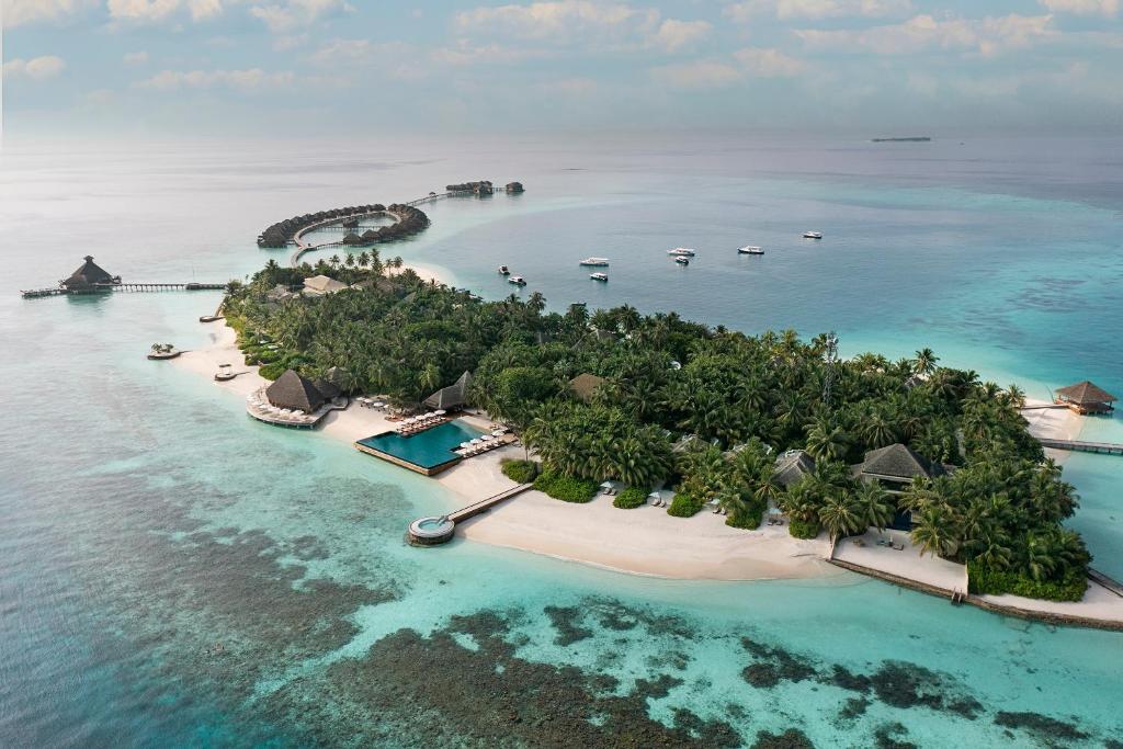 an aerial view of an island in the ocean at Huvafen Fushi in North Male Atoll