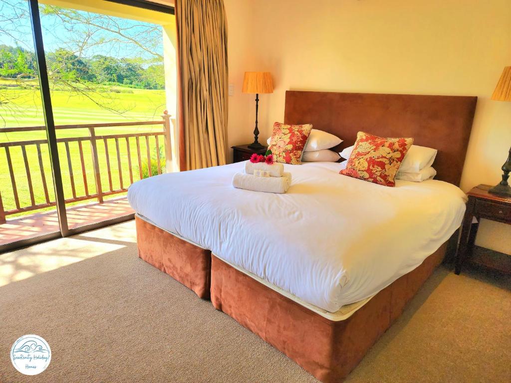 Villa G26 - Selborne Golf Estate tesisinde bir odada yatak veya yataklar