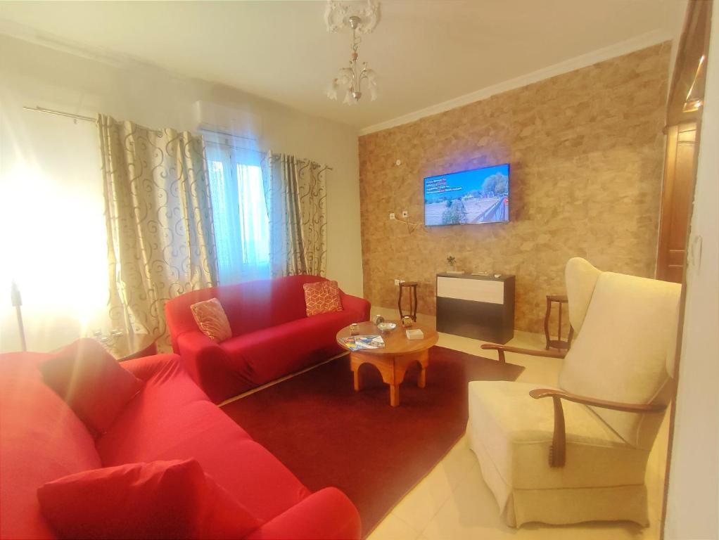 Posezení v ubytování Precious Apartment