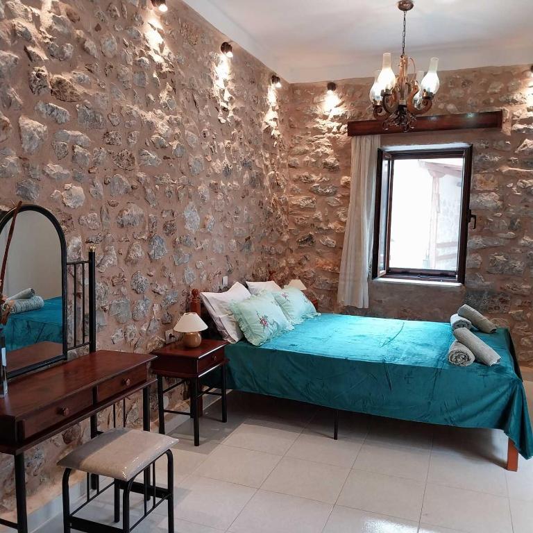Ένα ή περισσότερα κρεβάτια σε δωμάτιο στο Grandpa's home