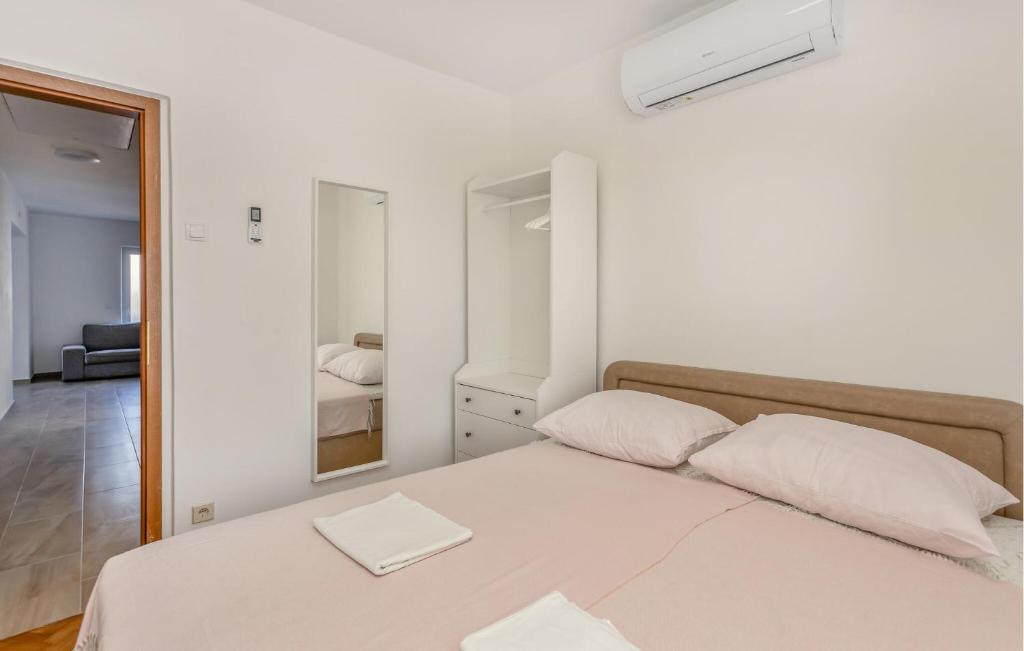 Posteľ alebo postele v izbe v ubytovaní Lovely Apartment In Sv,juraj