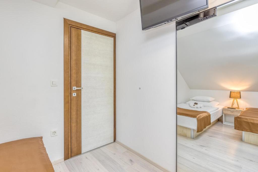 Postel nebo postele na pokoji v ubytování Villa Four Stars ART-PE