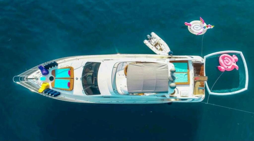 a boat floating in the water with a kite at Vision yatch in Göcek