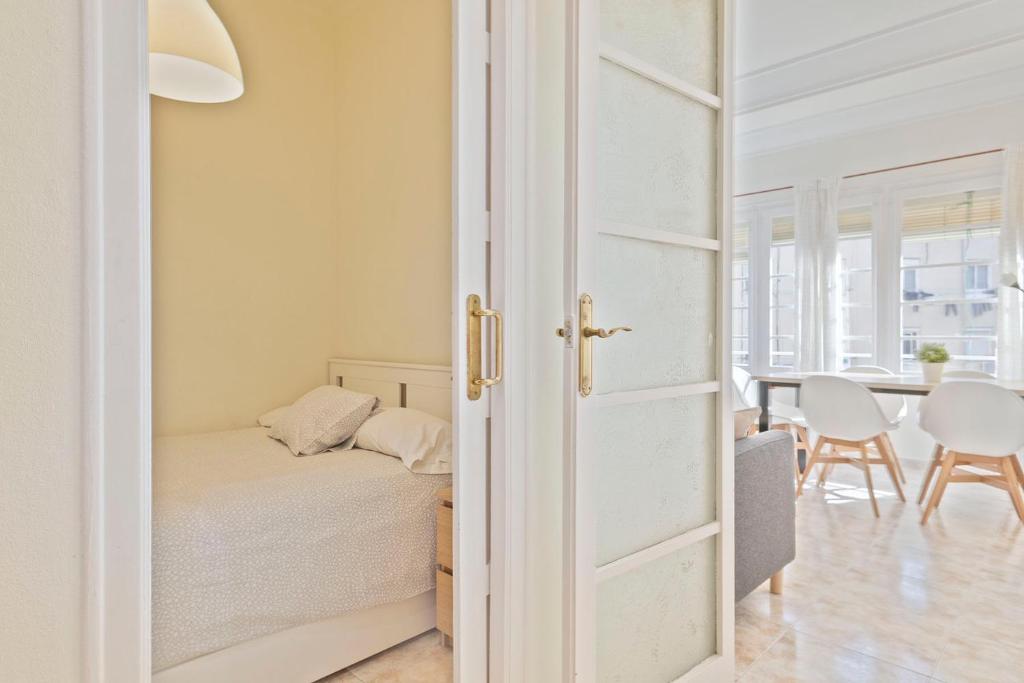 A bed or beds in a room at Apartmento Industria