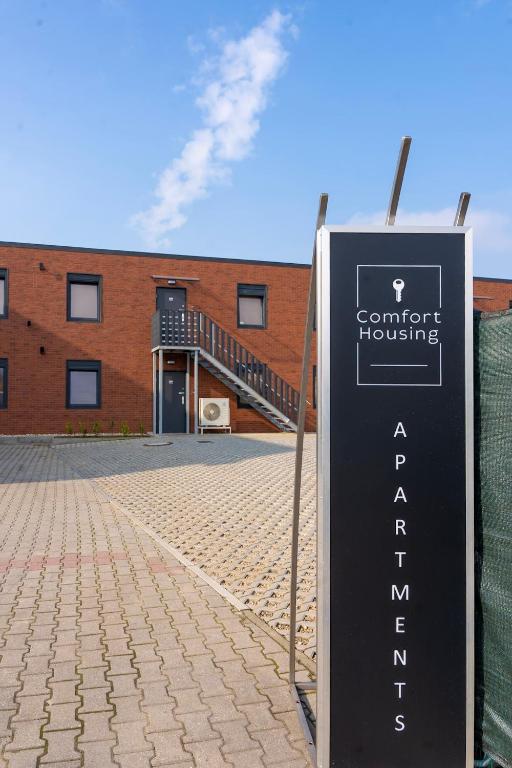 Ein Zertifikat, Auszeichnung, Logo oder anderes Dokument, das in der Unterkunft Comfort Housing Apartments ausgestellt ist