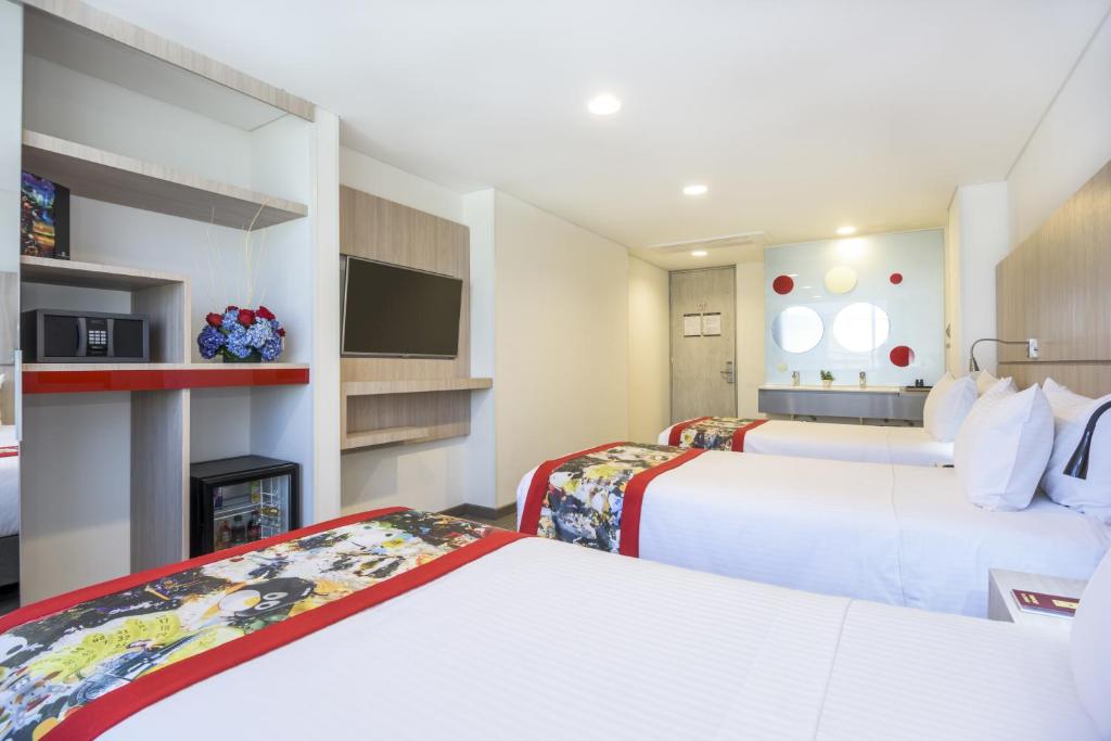 Postel nebo postele na pokoji v ubytování Hotel Black Tower Premium