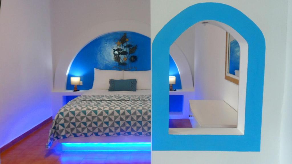 Postel nebo postele na pokoji v ubytování Papafotis Apartments & Suites