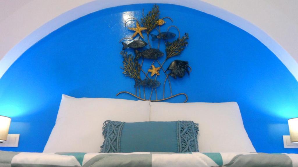 Postel nebo postele na pokoji v ubytování Papafotis Apartments & Suites
