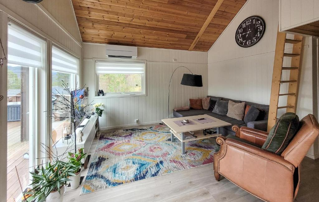 a living room with a couch and a table at Nice Home In Jelsa With Kitchen in Jelsa