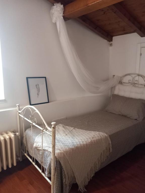 Postel nebo postele na pokoji v ubytování Radici - La finestra sui Sassi