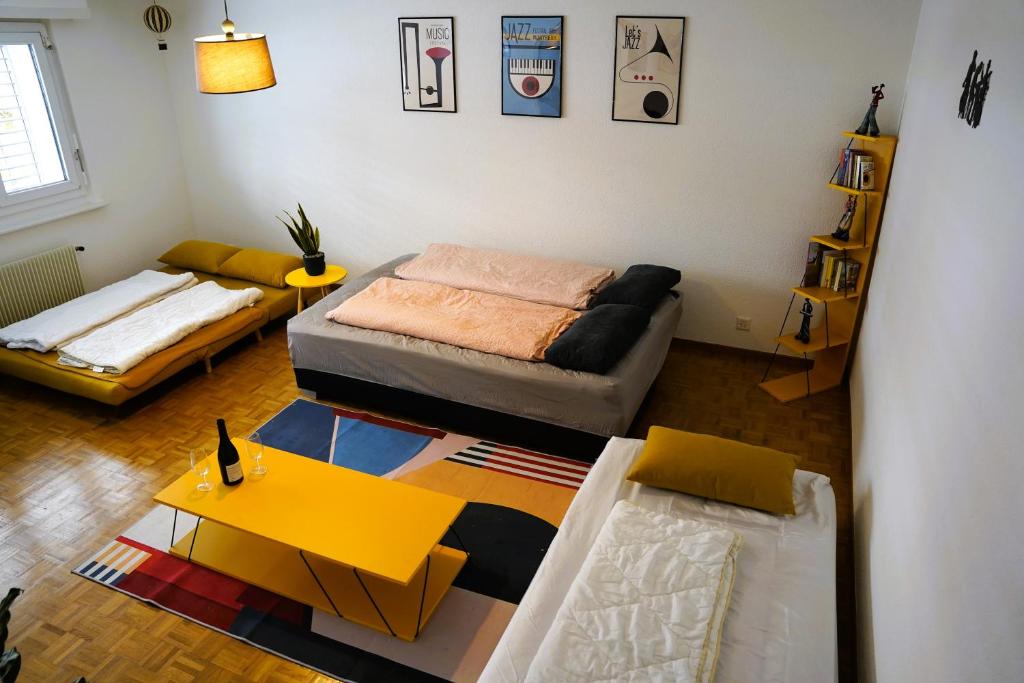 Ένα ή περισσότερα κρεβάτια σε δωμάτιο στο Studio 5 places à deux pas du Lac