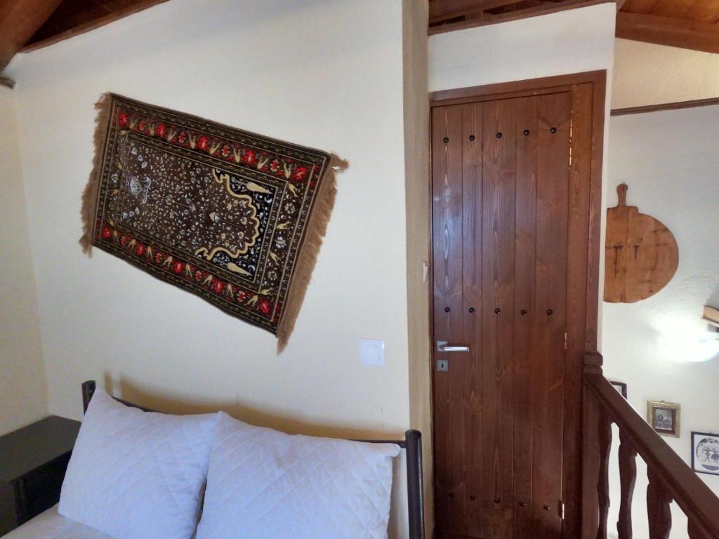 Postel nebo postele na pokoji v ubytování Pelion Cozy Residency