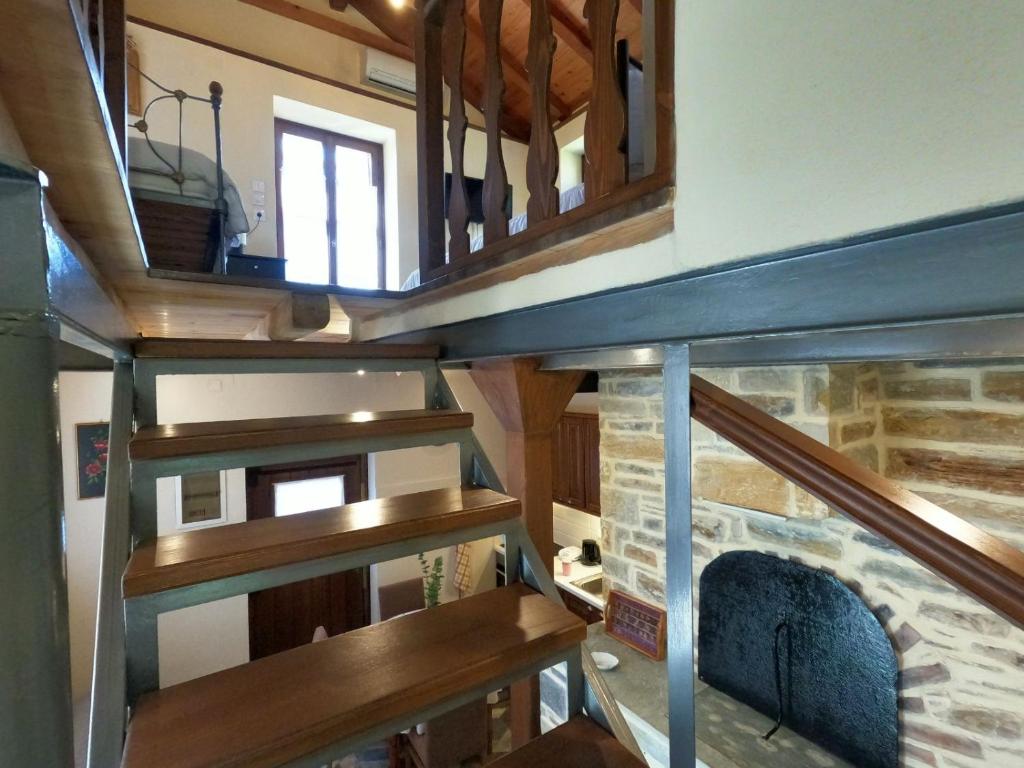 Palanda nebo palandy na pokoji v ubytování Pelion Cozy Residency