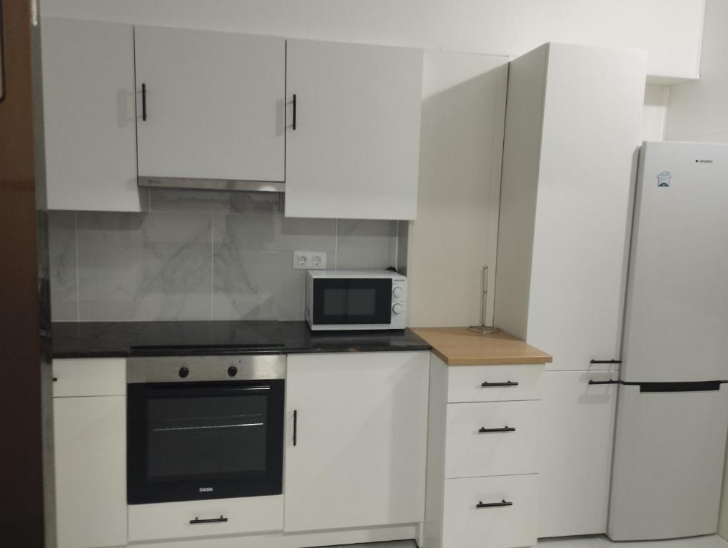 Kuchyň nebo kuchyňský kout v ubytování Casa de la playa VT-52170-V