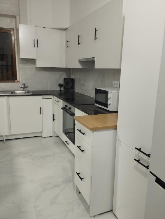 Kuchyň nebo kuchyňský kout v ubytování Casa de la playa VT-52170-V
