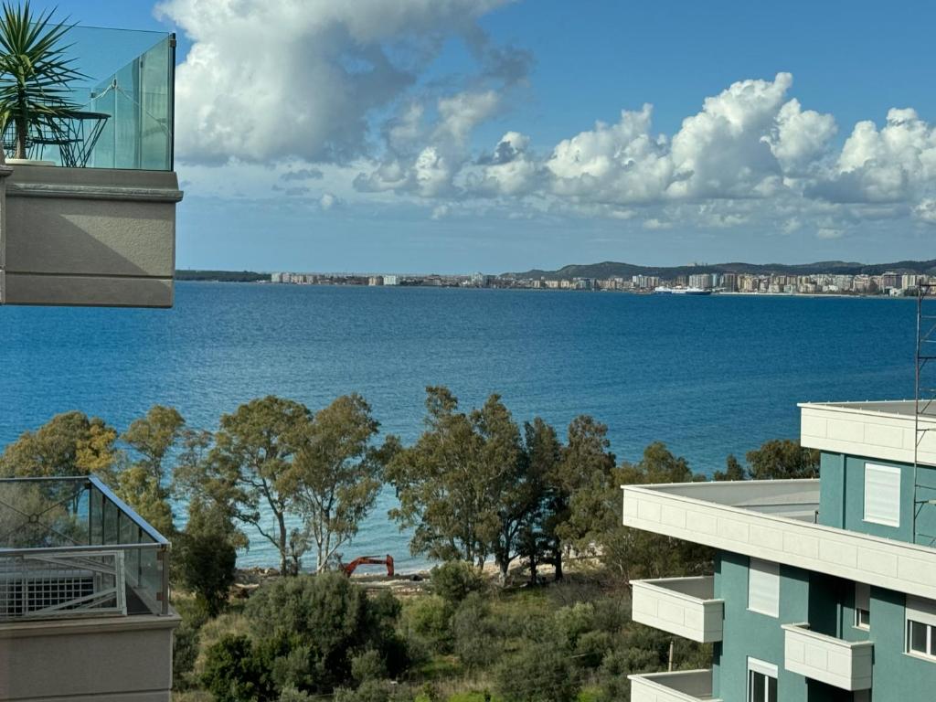 a view of the water from a building at Sunset Apartment in Vlorë