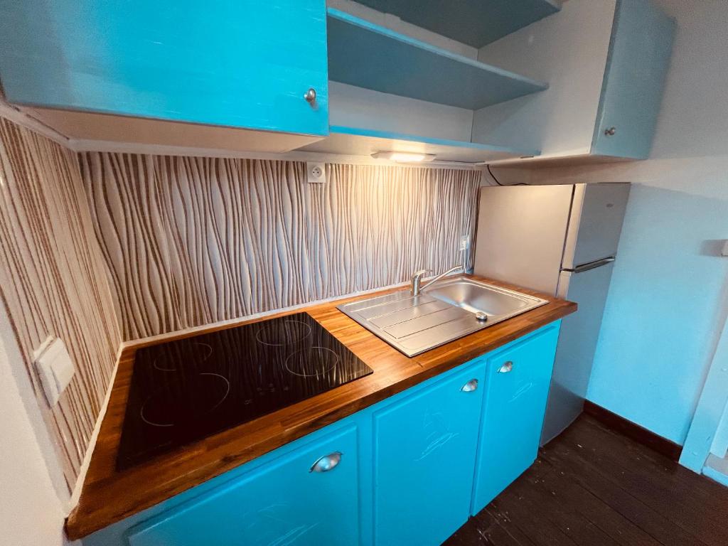 Kuchyň nebo kuchyňský kout v ubytování Tropicana Suites