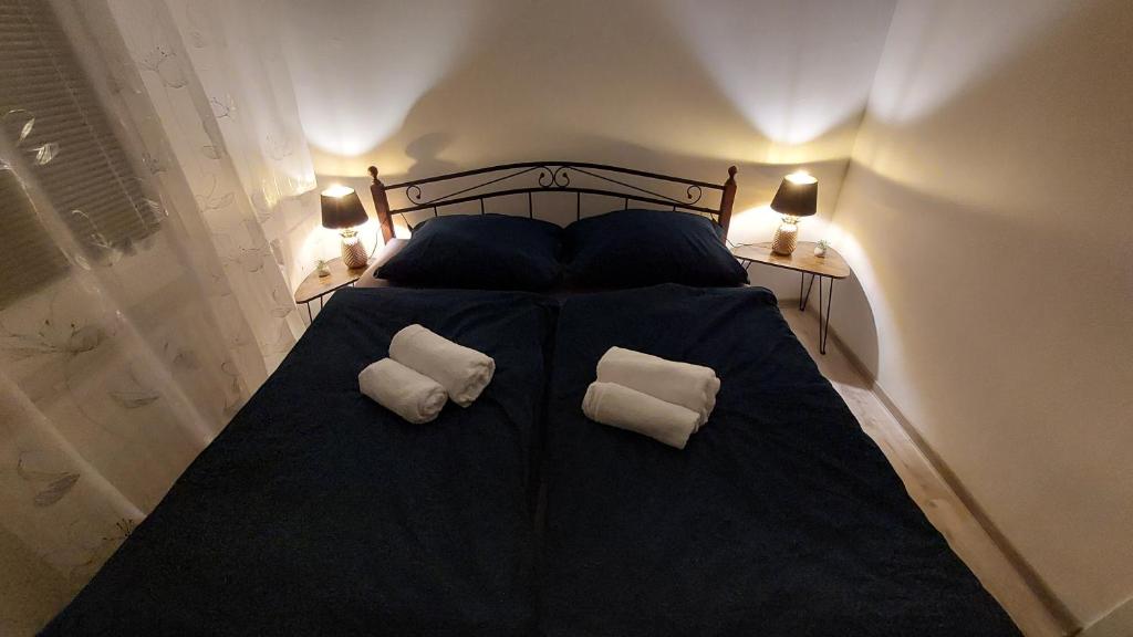Postel nebo postele na pokoji v ubytování Apartmán Šurany