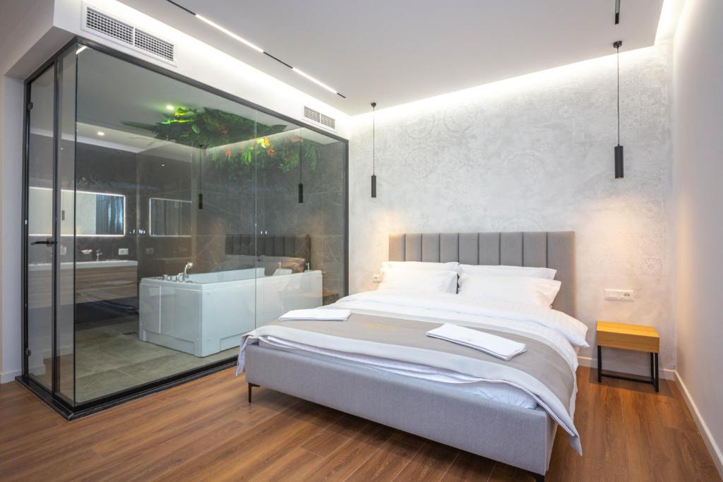Postel nebo postele na pokoji v ubytování Hotel Riviera