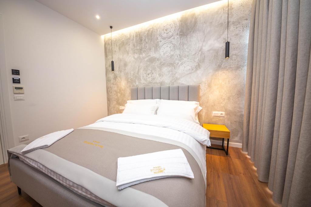 Postel nebo postele na pokoji v ubytování Hotel Riviera