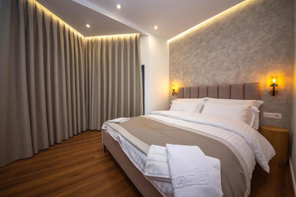 Postel nebo postele na pokoji v ubytování Hotel Riviera