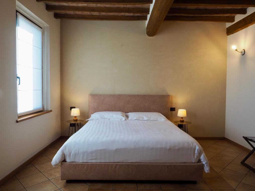 A bed or beds in a room at Agriturismo San Giuseppe