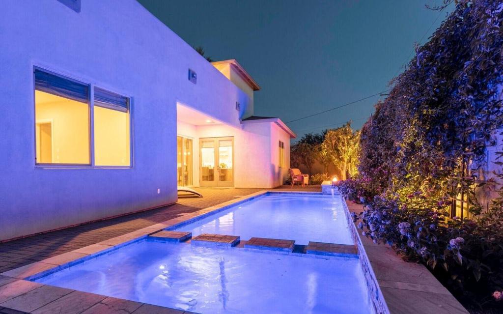 a swimming pool in the backyard of a house at Camelback Dwelling - Private Pool/Spa - In Old Town in Scottsdale