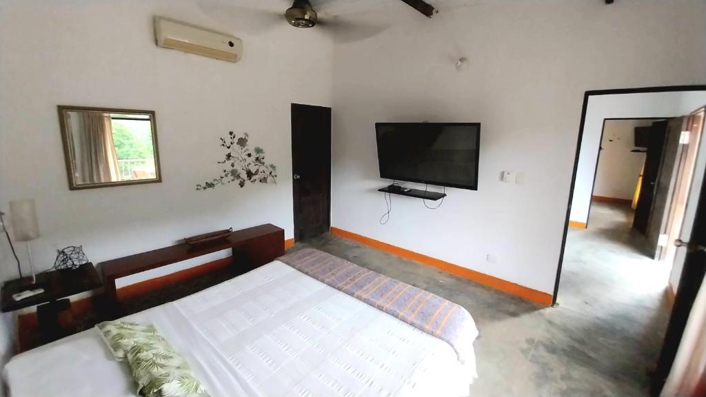 Postel nebo postele na pokoji v ubytování Casa San Cayetano