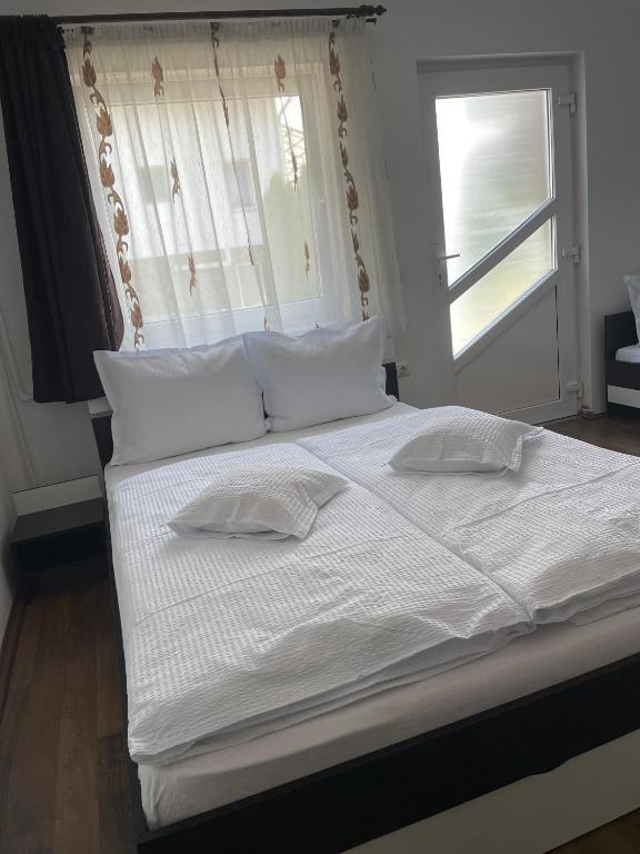 Postel nebo postele na pokoji v ubytování Casa Flamingo