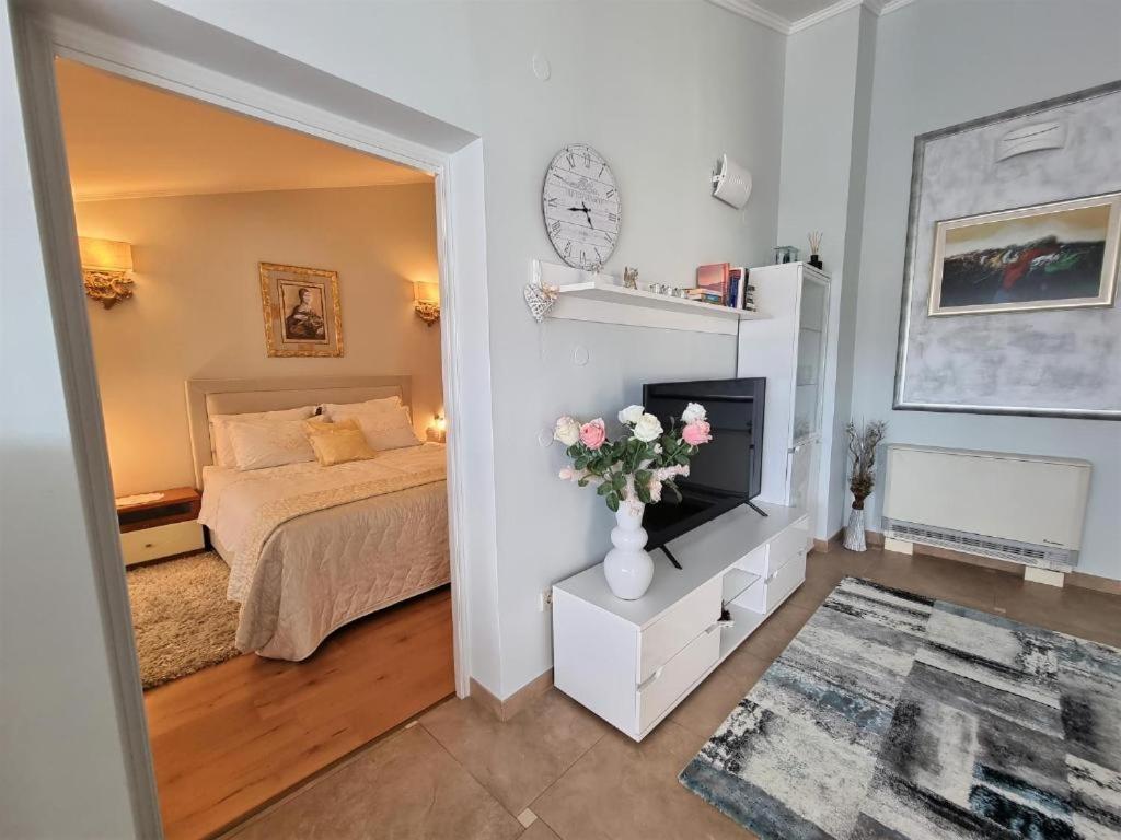 Postel nebo postele na pokoji v ubytování Apartments Ragusa
