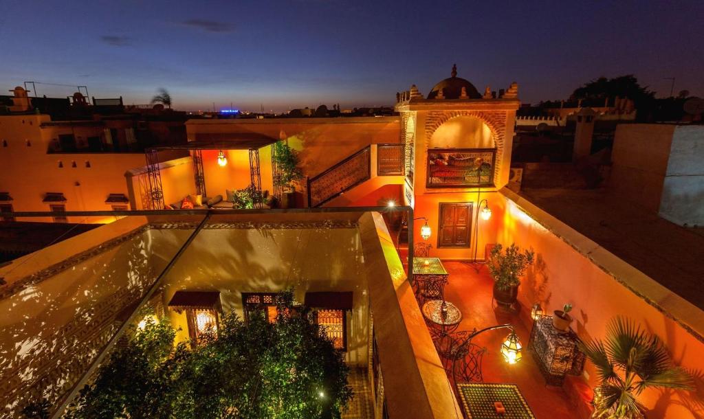 an aerial view of a building at night at Riad Louaya in Marrakesh