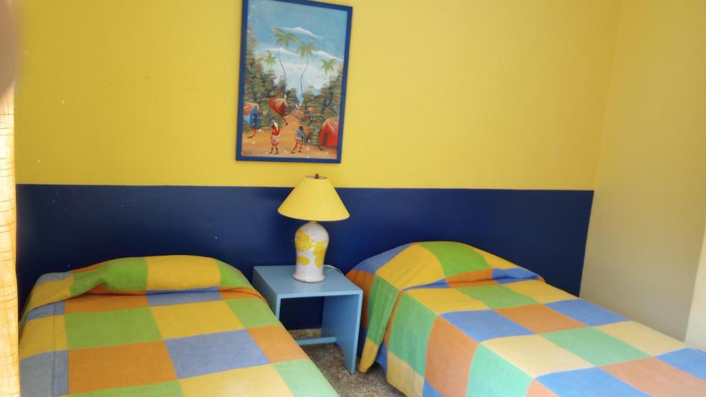 Postel nebo postele na pokoji v ubytování Casa Sylvie