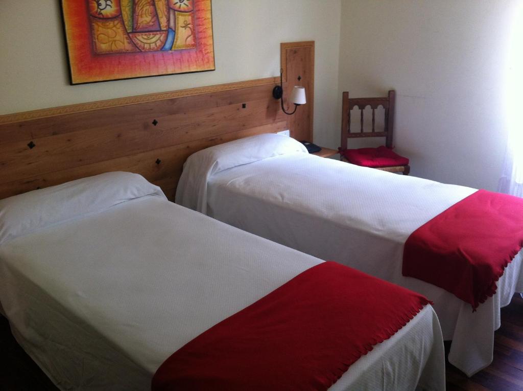 Postel nebo postele na pokoji v ubytování Hotel Boliña