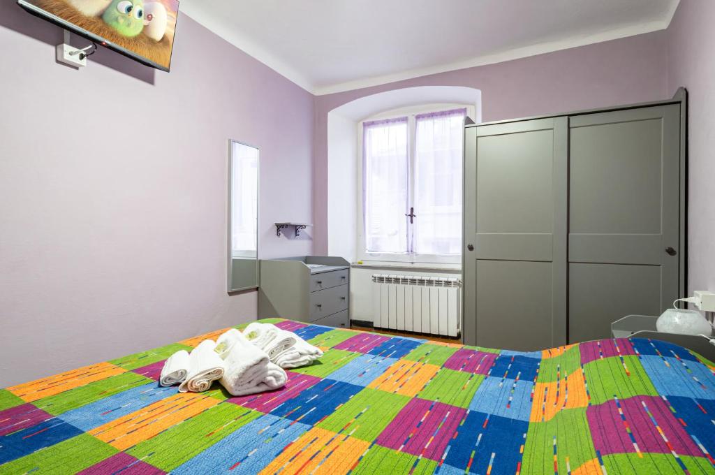 Postel nebo postele na pokoji v ubytování Ca' Du Beppino Portovenere Central Suite