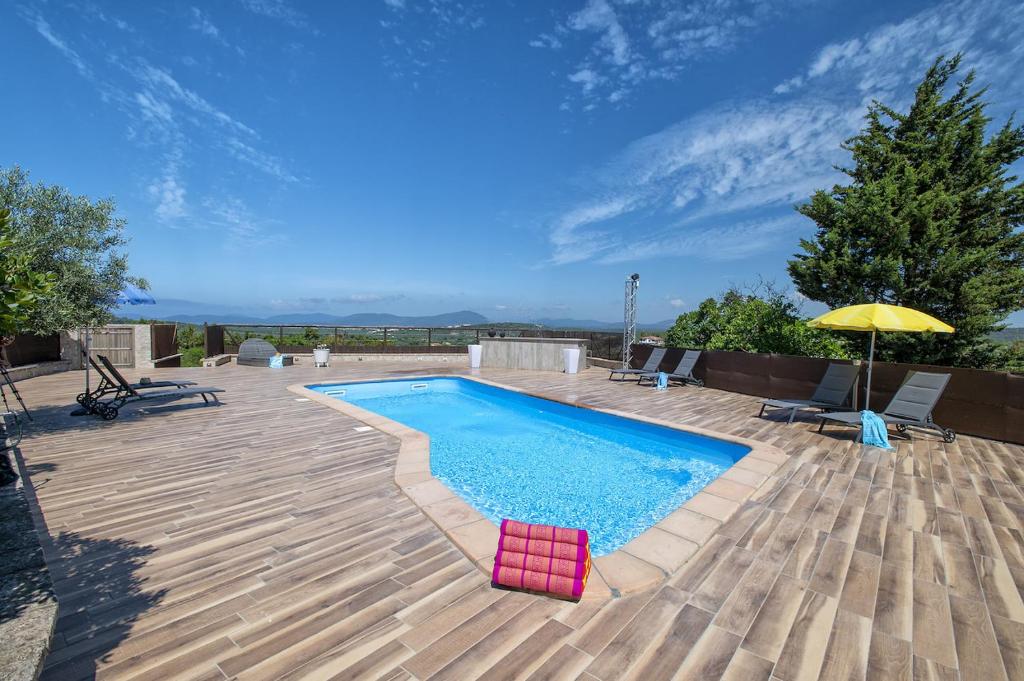 Bazén v ubytování Villa Luna e' Pedra - Suite in Villa con Vista sulla Baia di Alghero e Piscina nebo v jeho okolí