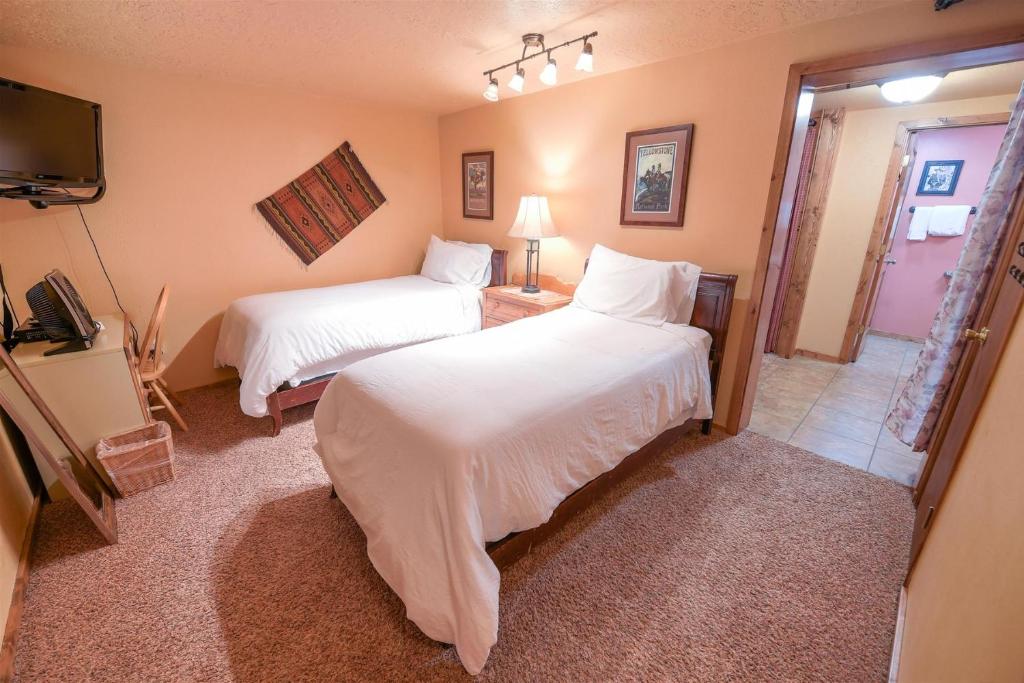 Postel nebo postele na pokoji v ubytování Trapper Condo Unit 3