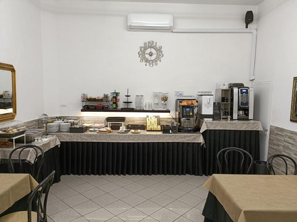 Kuchyň nebo kuchyňský kout v ubytování Hotel Cilene