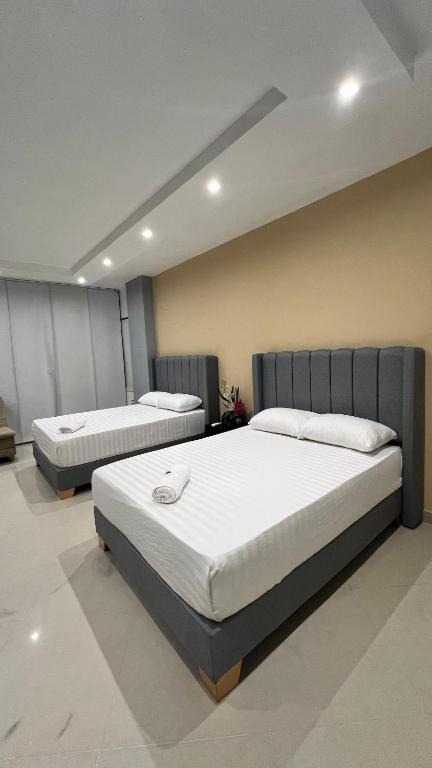 Letto o letti in una camera di Hotel Gran Conquistador 33